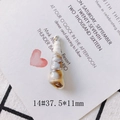 Detailed macro view of spiral seashell pendant with gold edge and size specs - Style 14# Spiral Shell (37.5*11mm)