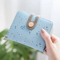 Light blue floral print short wallet with grainy texture and golden metal buckle clasp - Sky Blue