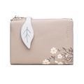 Kurze Geldbörse in Lotusrosa mit Gänseblümchen-Druck und weicher Ledertextur - Khaki