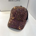 Zwarte hoed met gouden strass-steentjes