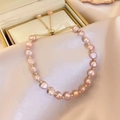 Detail of pink baroque freshwater pearl bracelet with adjustable golden slider clasp - 1# Champagne Pink Freshwater Pearl