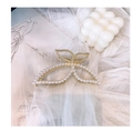 Golden butterfly wing hair claw clip with white pearls on elegant white mesh background - Pearl Butterfly