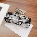 Hair claw clip with modern black and white geometric stripe pattern and matte finish - Large / Black and White