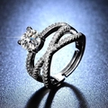 Macro shot of S925 sterling silver ring showing detailed six-prong setting and hallmark - Y108 Multi-layer Cross Pave