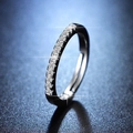 Close-up of adjustable silver eternity ring with pavé set cubic zirconia accents - Y111 Simple Pave Band