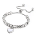 Bracciale a sfere argentate con ciondolo a cuore in smalto bianco e chiusura a scorrimento - Acciaio Bianco (KB165593-Z)