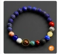Bracciale con perline sistema solare con pianeti in pietra colorata e dettaglio di perla ad anello - 8+8 Lapislazzuli