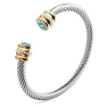 Silver twisted cable cuff bracelet with golden ends and sky blue round gemstone - December (Sky Blue)