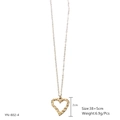 Detailed view of golden heart pendant with hammered texture and measurement markings - Hammered Heart