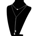 Double-layered silver necklace with heart and boy-girl pendants on a black bust model - Double Layer Heart And Boy Girl Figure Pendants (KN107917-Z)