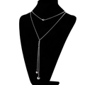 Collier double couche minimaliste en acier argenté avec pendentifs ronds en pompon - Style Pompon de Perles Rondes (KN107916-Z)