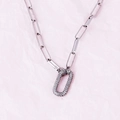 Silver paperclip link necklace featuring a crystal pavé oval clasp on pink background - Oval Platinum Plated Necklace