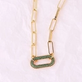 Close-up of gold paperclip chain necklace with green pave-set zircon oval link - Oval Green Zirconia Necklace