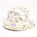 Detail of leaf pattern bucket hat showing linen texture and reinforced brim stitching - Beige