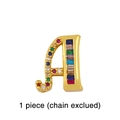 Macro view of gold-plated capital letter A charm with colorful cubic zirconia stones - Letter A Charm