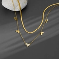 Elegant double-layered gold snake chain necklace with white enamel heart-shaped pendants - Gold E105