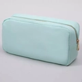 Light teal nylon makeup bag with premium gold zipper and durable woven texture finish - Mint Green
