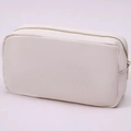Minimalist cream white nylon makeup bag with premium gold zipper for travel - Nude