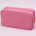 Waterproof nylon makeup bag in pink with gold zipper and premium minimalist aesthetic - Bubble Pink