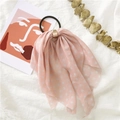 Pink polka dot ribbon hair tie with golden buckle on a minimalist white linen background - Polka Dot Dark Pink