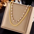 Detail showing double layer necklace with gold snake chain and white pearl beads - Double Layer Pearl Snake Chain Style (N1934)