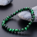 Macro detail of 6mm natural green tiger eye stone bracelet with cat eye effect sheen - Green Tiger Eye Bracelet (6mm)