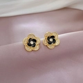 Macro detail of camellia flower stud earrings with white zircons and black enamel inlay - D224 Stud Earrings (Silver Pin Copper Gold Plated)