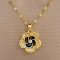 Macro shot of gold floral necklace pendant with black enamel and micro-pave crystals - D223 Necklace (Titanium Steel Chain Copper Pendant)