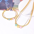 Golden titanium steel double layered necklace and bracelet set with three heart pendants - Gold Necklace + Bracelet Set