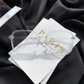 Stylish transparent square frame anti-blue light glasses on a black and white background - Plain Lens / Clear