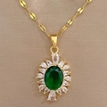 Detailed macro view of a gold-tone titanium necklace with green oval stone and white gems - D335 Necklace (Titanium Steel Chain Copper Pendant)