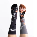 Asymmetric cartoon cotton socks with dog and woman motifs in stylish crew length - Lady Pets