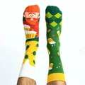 Detail of asymmetric St. Patrick's Day socks featuring leprechaun and green diamond patterns - Beer Beard Man