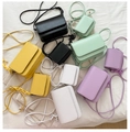 Detailed view of mini square crossbody bags in five colors with acrylic chains - Small / Purple