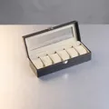 Uhrenbox aus schwarzem PU-Leder mit 6 Fächern, weißen Nähten und Sichtfenster aus Echtglas - 6 Slots - Beige Interieur