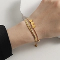 Double-layered gold titanium steel bracelet featuring heart pendants and snake chain link - Heart Double Layer Bracelet / Gold