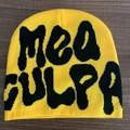 Bright yellow Mea Culpa knitted beanie with black jacquard lettering on wood background - One Size / Yellow Black