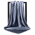 Elegant silver grey satin silk square scarf for women displayed on a modern black frame - Dark Gray