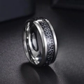 Macro detail of 8mm titanium steel ring with black enamel floral patterns and polished beveled edges - US 6 / Silver