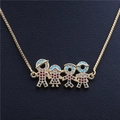 Detailed view of family pendant with colorful zircons on a gold box chain necklace - Family of Four / Gold