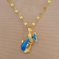 Detail of gold dolphin pendant featuring blue enamel inlay and sparkling zircon accents - Blue Dolphin (F412) / Gold/Blue