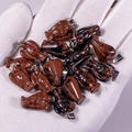 Natural brown jasper stone angel wing pendants with silver metal clasps on hand - Mahogany Obsidian