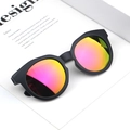 Detailed close-up of matte black round frame sunglasses with colorful gradient lenses - Black Frame Purple Red Lens