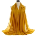 Vibrant yellow pearl chiffon long scarf wrap for women shown on a fashion mannequin - Ginger Yellow