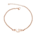 Detail of rose gold star and moon pendant bracelet with adjustable extension chain - Moon & Star / Rose Gold