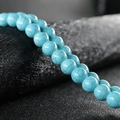Lose Türkisperlen-Kette mit natürlicher blauer Basis und brauner Netzstruktur für DIY - 4mm (ca. 90 Stk.) / Türkis