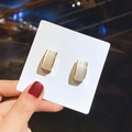 Rectangular opal cat eye stud earrings with gold metal frame held in hand - 26# White Cat Eye Earrings