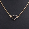 Collier en cuivre doré avec un pendentif en cœur serti de zircons multicolores - Style Coeur D