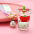 Close-up of strawberry milk tea cup keychain with liquid glitter and laser strap - Strap Clasp + Milk Tea Cup + Bead / Grass Green