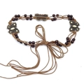 Detail of bohemian braided waist chain with wood beads and metal butterfly charms - 170cm / Yellow Butterfly